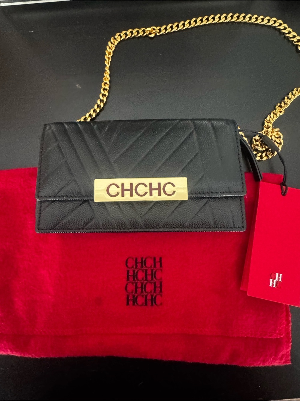Carolina Herrera Black Quilted Leather Crossbody with Gold Chain and Logo Plaque